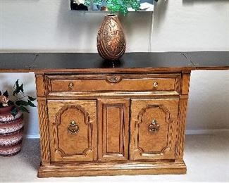 Serving cart/side table that expands out on both sides.