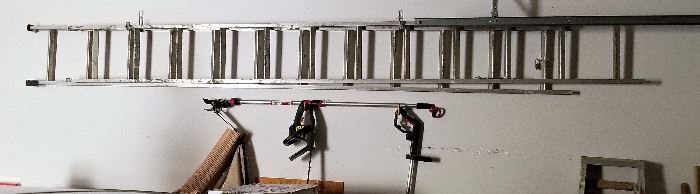 Extension ladder and other tools and smaller ladder for sale.