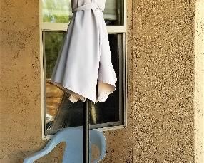 Outdoor beige table umbrella