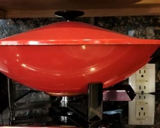 A red flying saucer? That's where they got the design for a wok!