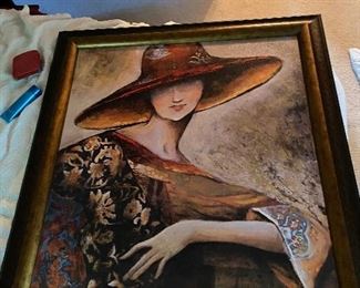 Large framed print of lady in big hat
