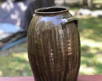 Lot 2: Catawba Valley Jar, Some slight dull chips and nicks due to age, No cracks; Markings: Single incised mark at bottom/body of the jar; Measuring 12" tall, 8" widest point. Purchase Price: $150.
