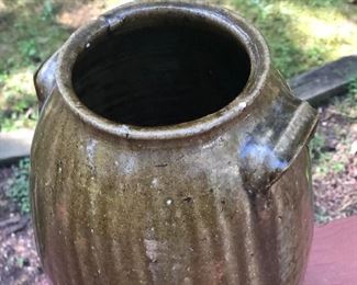 Lot 2: Catawba Valley Jar, Some slight dull chips and nicks due to age, No cracks; Markings: Single incised mark at bottom/body of the jar; Measuring 12" tall, 8" widest point. Purchase Price: $150.