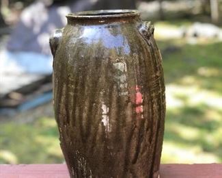 Lot 2: Catawba Valley Jar, Some slight dull chips and nicks due to age, No cracks; Markings: Single incised mark at bottom/body of the jar; Measuring 12" tall, 8" widest point. Purchase Price: $150.