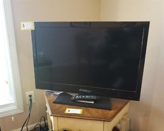 2 Vizio and 1 Emerson  televisions