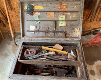 #97 Vintage trunk on casters with old tools 32"x25"x19" $125.00