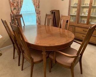 	#49	American of Martinsville "Tribune" mid century oval dining table with 3 leaves and 6 chairs (captains chairs)44"x65-103"x29" bought 11/6/1963	 $275.00 		