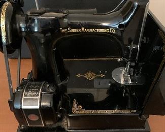 #64 Singer Featherweight Sewing machine serial #AK579219 it is clean, wheel turns smoothly, it has metal bobbin housing, attachments, foot pedal, booklet, and case, it is in beautiful condition!	 $375.00 		
	