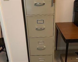 	#66	4 drawer metal filing cabinet with key	 $25.00 		