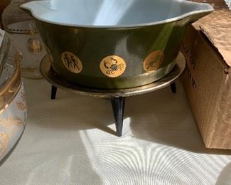 #99 Vintage Pyrex with zodiac signs and stand $40.00
