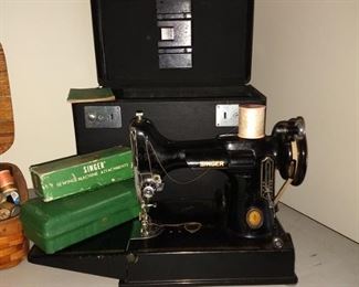 221 Singer Featherweight sewing machine, with case and attachments 