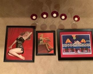 A Red Variety of Artwork and Glass Candle Holders