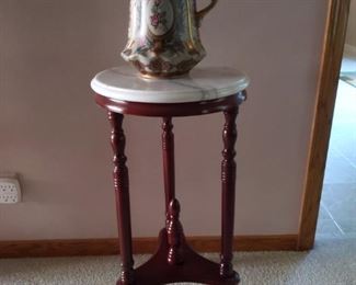 Marble Top Table and Ceramic Pitcher