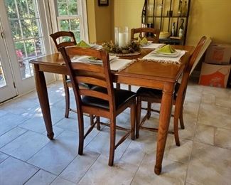 Kitchen table that has six chairs