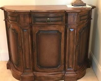https://ctbids.com/#!/description/share/537416 Elegant 48" Console Table w/ Storage. Measures 48 inches at its largest point by 19.5 inches deep and 35 inches tall. Items inside not included.
