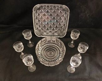 https://ctbids.com/#!/description/share/537434 6 crystal cordial glasses. One round glass bowl. One square serving bowl.
