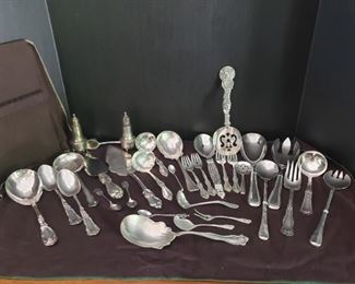 https://ctbids.com/#!/description/share/537455 Sterling and Other Serving Pieces. 5 pieces horizontally placed at the bottom of the cover photo are sterling as well as 1 pie server. The others are silverplated or stainless.