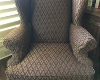 https://ctbids.com/#!/description/share/537495 Wingback Rich Brown Patterned Chair. Measures approximately 30.5 inches by 34 inches and 45 inches tall.