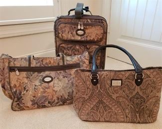 https://ctbids.com/#!/description/share/537562 Includes Pierre Cardin carry on and hand bag and Liz Claiborne hand bag.