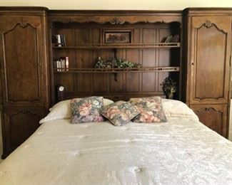 https://ctbids.com/#!/description/share/537627 Villandry by Henredon Large Cabinets with Shelving In The Middle. Bed and other items pictured on shelves are not included. Each Cabinet has 2 doors. Top has shelving inside and the bottom Has drawers. There are 3 shelves in the middle and 3 storage places below the shelves. One cabinet measures 29 by 19 inches and 85.5 inches tall. The shelving in the middle is 79.5 across. Shelves are 12.5 inches deep. Top 2 shelves have glass bases. It comes in 4 pieces according to the owner.