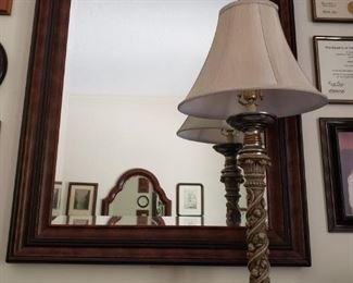 https://ctbids.com/#!/description/share/537653 Large mirror with beveled edges and a two-toned border. Mirror measures 31.5" x 43.5". Lamp not included.