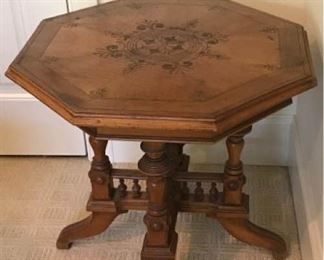 https://ctbids.com/#!/description/share/545012 Victorian Side Table with Carved Decorative Design. Beautiful, unique table in the Victorian Lakeside style (casual furniture for the wealthy families' lake houses). Measures approximately 25 inches across and is 23 inches tall.