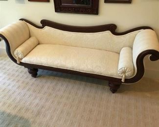 https://ctbids.com/#!/description/share/545023 *Reserve Price of $250* Cream colored upholstered sofa with turned wood legs. Curving arms and back and two small tassel trimmed side pillows. Approx 80" in width.