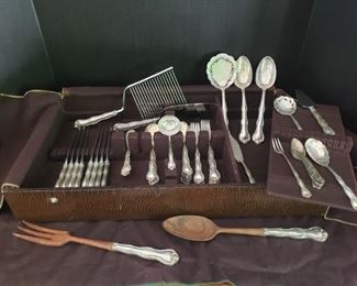 https://ctbids.com/#!/description/share/545045 Gorham Sterling Silver: Rondo. 7 dinner forks, 6 salad forks, 11 teaspoons, 6 soup spoons, 8 knives, 5 spreaders, 6 small spoons, 13 serving pieces. Comes in protective case.
