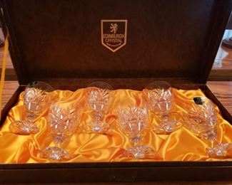 https://ctbids.com/#!/description/share/545051 Edinburgh Crystal Cameron Pattern (flower of Scotland). Set of 6 glasses. Made in Scotland. Brought home from Scotland as a gift from owner's husband over 40 years ago.