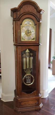 https://ctbids.com/#!/description/share/545484 Vintage Howard Miller Grandfather Clock. *Reserve Price Set For $3000* Model Number 610-241. Serial number is 415916. Measures Approximately 87 1/2 X 27" X 18". In perfect working condition. Please see the video at the end of the photos. A clock is a focal point to any room. It's function as a timepiece, the beautiful chimes and melodies it plays, and the heirloom appeal will enhance your life at home. Clock weighs 200+ lbs. Includes direction for packing and moving along with how to set the musical chimes.