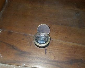 ink well in antique wardrobe