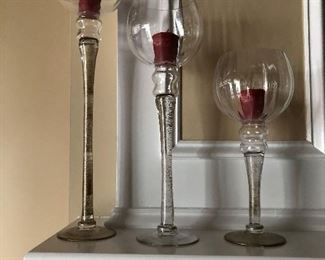 3 staggard candle holders w/candles  