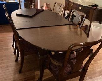 Absolutely stunning dining room table w/6 chairs, 2 leaves & table pads.  A MUST SEE!!!!