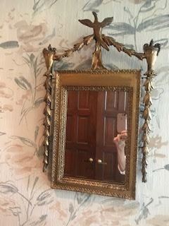 Bird decorated antique mirror
