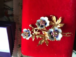 Enamel flower with rubies centers set in 18K gold pin
