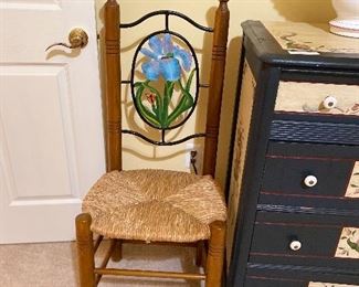 wicker side chair with iron flower accent
