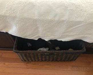basket on side of bed