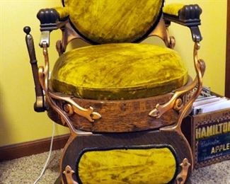 Antique Refurbished Barber's Chair With Brass Accents And Claw Armrests