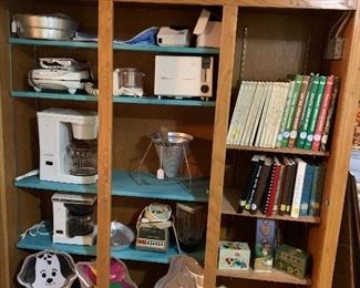 Vintage appliances and cake pans. Recipe books