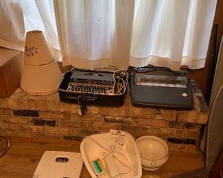 Vintage typewriters, weight scales and more