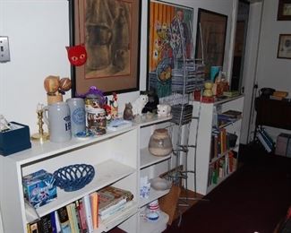 book shelves full at top of stairs