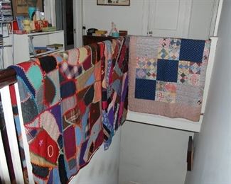 Top of stairs--3 vintage quilts
