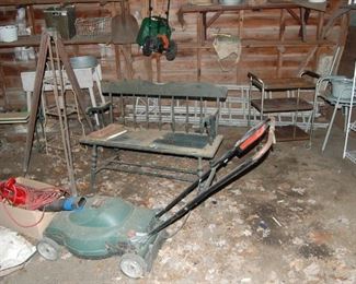 lots of ladders, old bench, tripod base for surveyor
