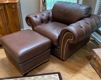 47. Ferretti Interiors Leather Armchair (48" x 36" x 32") and Ottoman (25" x 22" x 18")