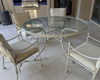 54" round with 4 chairs glass top table good condition $295