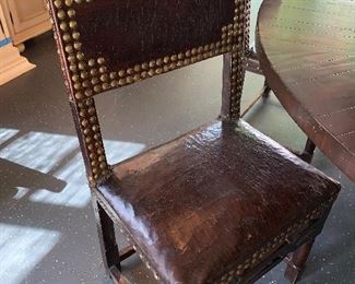 A Set of 8nFrench Renaissance Style Leather side chair with nail head decoration (circa 1700) - 38.25"x22"x17.5"d.  Price for set $7,500.00