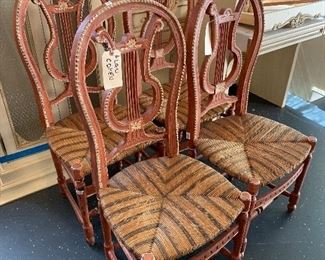 Set of 4 antique Italian harp motif side chairs with straw seat. Price 1,500.00