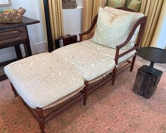 A late 19th Century French Provencal overcall rush seated chaise.  38"x71"x32" - 14"T seat, 25"T arm.  Price $2,800.00