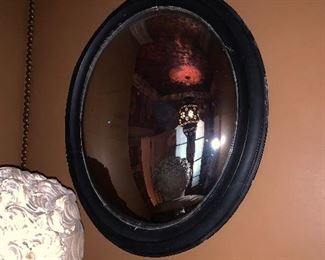Early 19th century black oval convex mirror circa 1810 - Price $950
