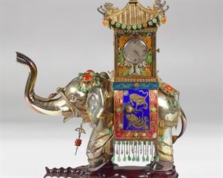 LOT 260: 20TH C. ENAMELED SILVER ELEPHANT CLOCK W/ STAND